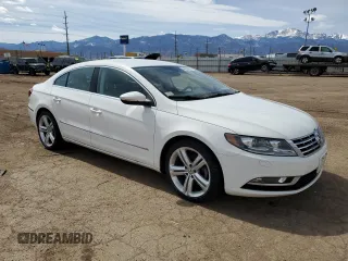 2013 Volkswagen CC Sport Plus z VIN WVWBP7AN9DE521699, wystawiony jako Copart lot #48622655 z przebiegiem 118 157 mil mil oraz Czysty tytuł • Clean title. Historia ofert i sprzedaży dostępna na DreamBid. Obrazek 4.