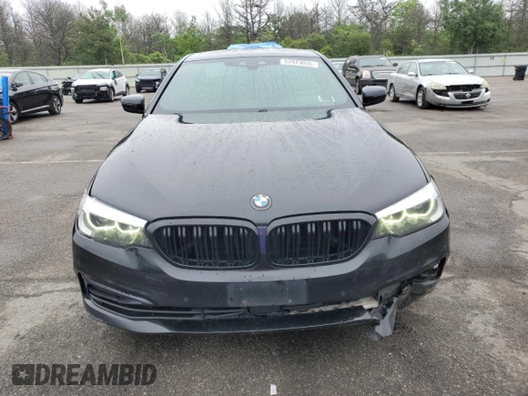 2019 BMW 5 Series 540i xDrive with VIN WBAJE7C54KWW19994, listed as a Copart auction lot 57973055 with 121,995 mi miles and Salvage title. Bid and sale history available at DreamBid. Image 5.