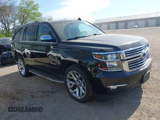 2016 Chevrolet Tahoe LTZ z VIN 1GNSKCKCXGR212705, wystawiony jako IAAI lot #42102521 z przebiegiem 196 115 mil mil oraz . Historia ofert i sprzedaży dostępna na DreamBid. Obrazek 1.