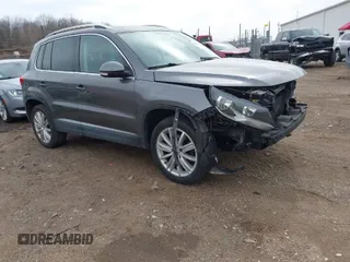 2012 Volkswagen Tiguan SE with VIN WVGBV7AX9CW004706, listed as a IAAI auction lot 41830301 with 119,131 mi miles and . Bid and sale history available at DreamBid. Image 1.