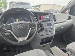 2020 Toyota Sienna LE with VIN 5TDJZ3DC5LS251503, listed as a IAAI auction lot 42610520 with 131,850 mi miles and . Bid and sale history available at DreamBid. Image 6.