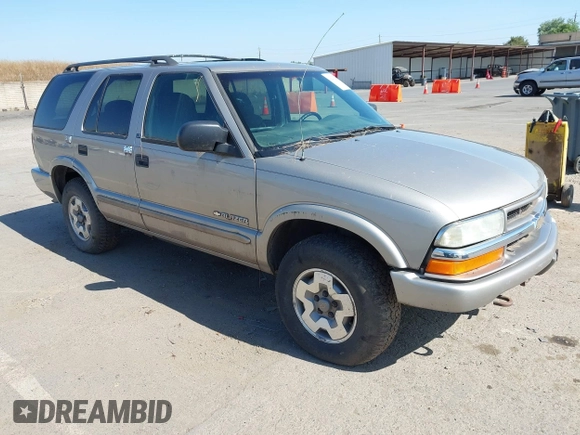 2003 Chevrolet Blazer LS z VIN 1GNDT13X63K146670, wystawiony jako IAAI lot #42200426 z przebiegiem 129 516 mil mil oraz . Historia ofert i sprzedaży dostępna na DreamBid. Obrazek 1.