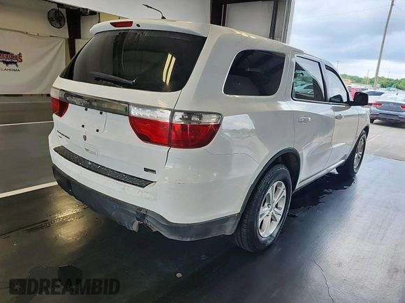 2013 Dodge Durango SXT with VIN 1C4RDJAG8DC671689, listed as a IAAI auction lot 42743958 with 160,950 mi miles and . Bid and sale history available at DreamBid. Image 26.