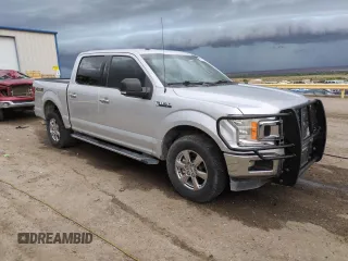 2018 Ford F-150 XL with VIN 1FTEW1E57JKC62666, listed as a Copart auction lot 61619235 with 149,759 mi miles and Clean title. Bid and sale history available at DreamBid. Image 4.