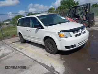 2010 Dodge Grand Caravan SE with VIN 2D4RN4DE5AR490306, listed as a IAAI auction lot 41944376 with 127,107 mi miles and . Bid and sale history available at DreamBid. Image 1.