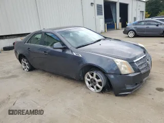 2009 Cadillac CTS RWD w/1SA with VIN 1G6DF577190101273, listed as a Copart auction lot 71158424 with 131,622 mi miles and Salvage Title. Bid and sale history available at carsss.com. Image 4.
