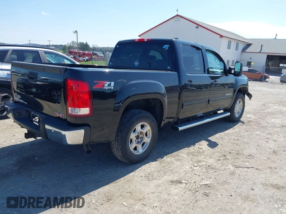 2012 GMC Sierra 1500 SLT with VIN 3GTP2WE70CG134587, listed as a IAAI auction lot 41973632 with 206,378 mi miles and . Bid and sale history available at DreamBid. Image 4.