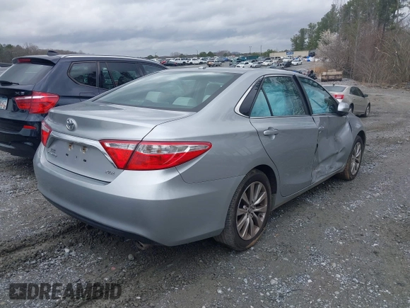 2015 Toyota Camry XLE with VIN 4T1BF1FKXFU955780, listed as a IAAI auction lot 41731667 with 210,750 mi miles and . Bid and sale history available at DreamBid. Image 4.