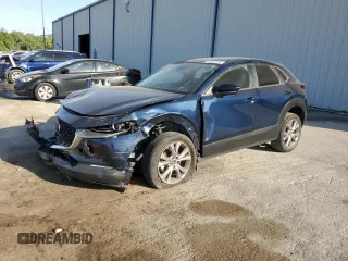 2021 Mazda CX-30 Select z VIN 3MVDMABL9MM318560, wystawiony jako Copart lot #55080505 z przebiegiem 27 308 mil mil oraz Nie do naprawy • Non repairable. Historia ofert i sprzedaży dostępna na DreamBid. Obrazek 1.