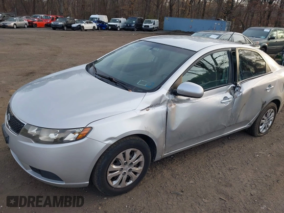 2011 Kia Forte LX with VIN KNAFT4A24B5403622, listed as a IAAI auction lot 41774093 with 143,971 mi miles. Bid and sale history available at carsss.com. Image 6.