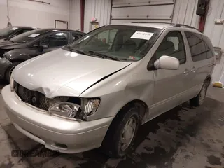 2003 Toyota Sienna LE with VIN 4T3ZF13C53U510457, listed as a IAAI auction lot 41642470 with 219,515 mi miles. Bid and sale history available at carsss.com. Image 2.