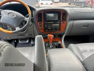 2001 Lexus LX 470 z VIN JTJHT00W313508801, wystawiony jako Copart lot #60938545 z przebiegiem 118 013 mil mil oraz Czysty tytuł • Clean title. Historia ofert i sprzedaży dostępna na DreamBid. Obrazek 9.