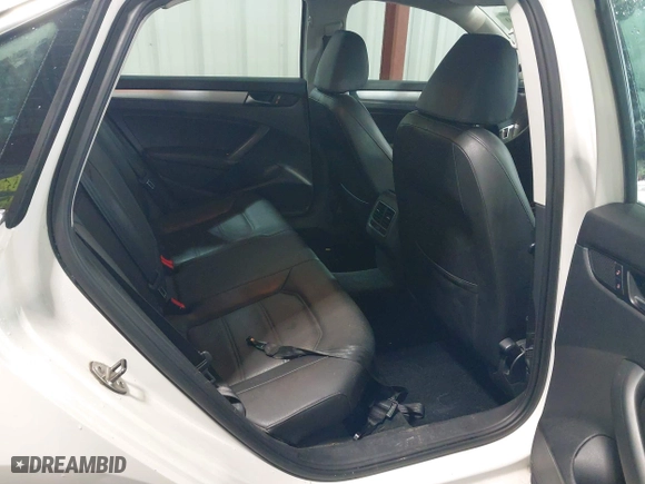 2013 Volkswagen Passat SE w/Sunroof with VIN 1VWBH7A35DC111003, listed as a IAAI auction lot 41991990 with 142,103 mi miles. Bid and sale history available at carsss.com. Image 8.