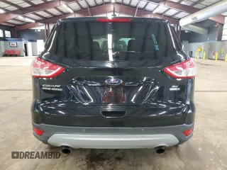 2016 Ford Escape SE with VIN 1FMCU9GX2GUA48039, listed as a Copart auction lot 55997965 with 117,932 mi miles and Clean Title. Bid and sale history available at DreamBid. Image 6.