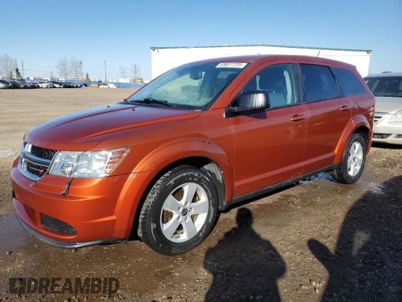 2013 Dodge Journey American Value with VIN 3C4PDCAB4DT590975, listed as a Copart auction lot 55627725 with 212,659 mi miles and Clean Title. Bid and sale history available at DreamBid. Image 1.