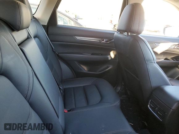 2018 Mazda CX-5 Grand Touring z VIN JM3KFBDM6J0337006, wystawiony jako Copart lot #87155694 z przebiegiem 50 643 mil mil oraz Szkoda całkowita • Salvage title. Historia ofert i sprzedaży dostępna na DreamBid. Obrazek 10.