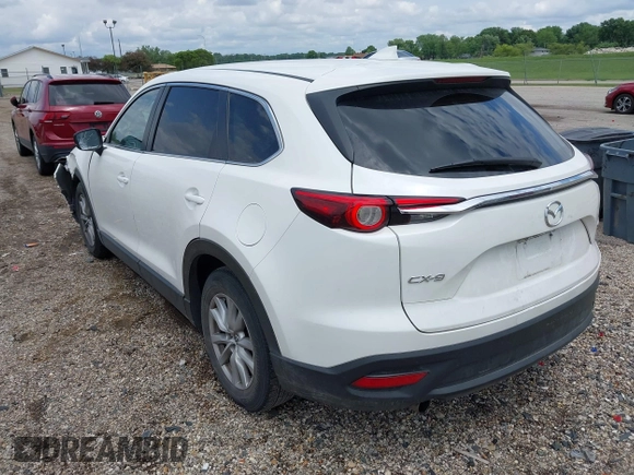 2016 Mazda CX-9 Sport with VIN JM3TCABY4G0100620, listed as a IAAI auction lot 42316216 with 191,245 mi miles and . Bid and sale history available at DreamBid. Image 3.