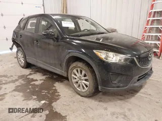2015 Mazda CX-5 Sport with VIN JM3KE4BY0F0542655, listed as a IAAI auction lot 41471568 with 165,386 mi miles. Bid and sale history available at carsss.com. Image 1.