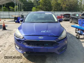 2015 Ford Focus SE with VIN 1FADP3F2XFL299193, listed as a Copart auction lot 59744715 with 141,317 mi miles and Salvage title. Bid and sale history available at DreamBid. Image 5.