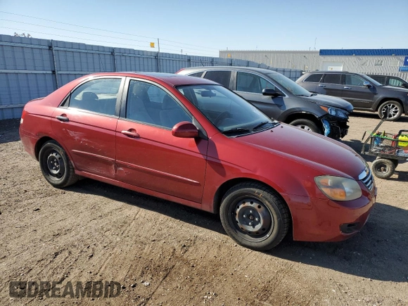 2009 Kia Spectra EX with VIN KNAFE221395656476, listed as a Copart auction lot 77700844 with 90,079 mi miles and Salvage Title. Bid and sale history available at carsss.com. Image 4.