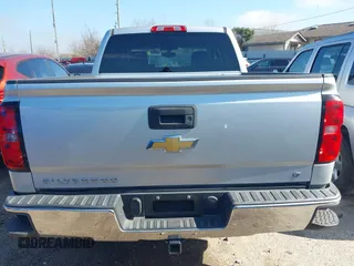2015 Chevrolet Silverado 1500 LT with VIN 3GCPCREH0FG152809, listed as a IAAI auction lot 41573835 with 213,410 mi miles and . Bid and sale history available at DreamBid. Image 16.