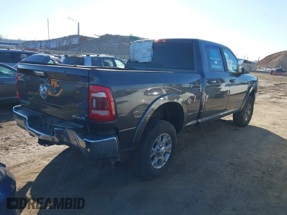 2021 Ram 2500 Laramie z VIN 3C6UR5FL7MG629012, wystawiony jako IAAI lot #41369353 z przebiegiem 168 099 mil mil oraz . Historia ofert i sprzedaży dostępna na DreamBid. Obrazek 4.