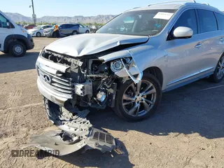 2015 Infiniti QX60 with VIN 5N1AL0MN7FC553099, listed as a IAAI auction lot 42094321 with 100,023 mi miles and . Bid and sale history available at DreamBid. Image 6.
