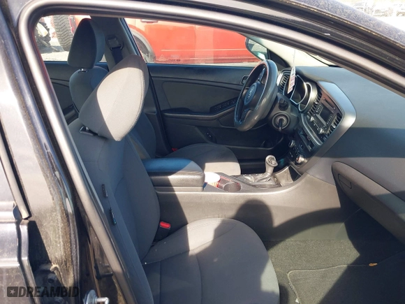 2015 Kia Optima LX with VIN KNAGM4A71F5630673, listed as a IAAI auction lot 42106584 with 245,005 mi miles. Bid and sale history available at carsss.com. Image 5.