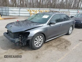 2015 Volkswagen Passat 1.8T Limited Edition with VIN 1VWAT7A31FC049502, listed as a IAAI auction lot 41833759 with 121,099 mi miles. Bid and sale history available at carsss.com. Image 2.