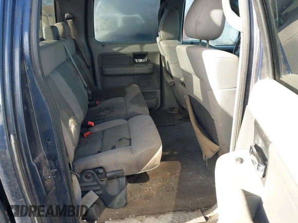 2005 Ford F-150 XLT with VIN 1FTRW12W25KB58736, listed as a IAAI auction lot 41119113 with 218,797 mi miles. Bid and sale history available at carsss.com. Image 8.
