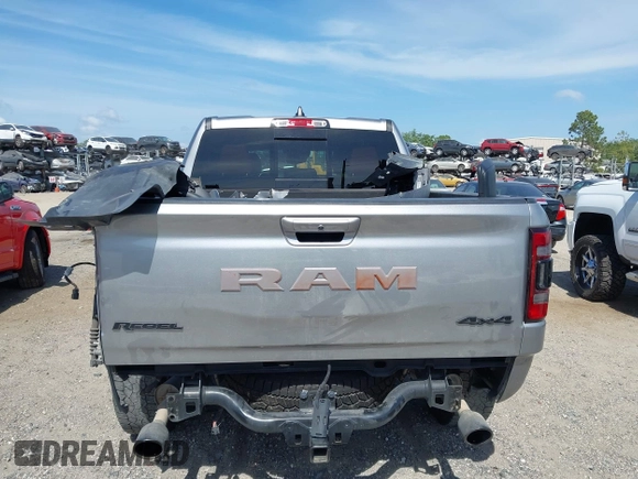 2022 Ram 1500 Rebel z VIN 1C6SRFLT2NN351050, wystawiony jako IAAI lot #41976882 z przebiegiem 59 490 mil mil oraz . Historia ofert i sprzedaży dostępna na DreamBid. Obrazek 17.