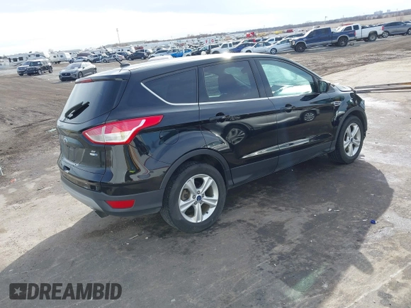 2016 Ford Escape SE with VIN 1FMCU9G90GUB25458, listed as a IAAI auction lot 41643349 with 158,439 mi miles and . Bid and sale history available at DreamBid. Image 4.