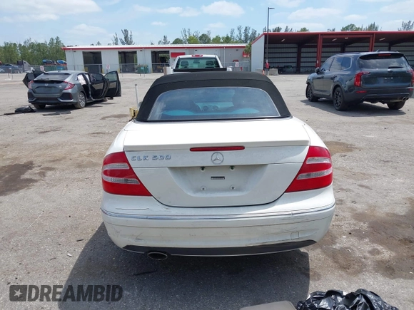 2005 Mercedes-Benz CLK 5.0L with VIN WDBTK75J55F123328, listed as a IAAI auction lot 42082590 with 58,969 mi miles. Bid and sale history available at carsss.com. Image 16.