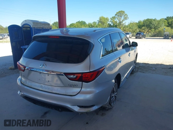 2020 Infiniti QX60 Luxe with VIN 5N1DL0MM2LC503968, listed as a IAAI auction lot 41797974 with 65,128 mi miles and . Bid and sale history available at DreamBid. Image 4.