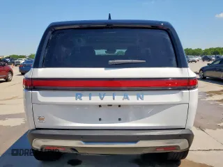 2023 Rivian R1S Launch Edition z VIN 7PDSGABL9PN010792, wystawiony jako Copart lot #56359465 z przebiegiem 24 319 mil mil oraz Szkoda całkowita • Salvage title. Historia ofert i sprzedaży dostępna na DreamBid. Obrazek 6.