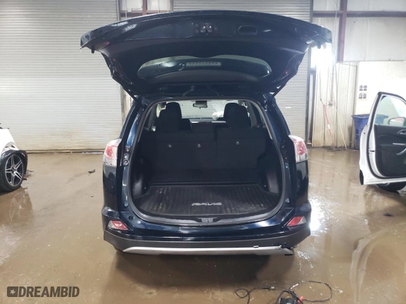 2017 Toyota RAV4 Hybrid XLE with VIN JTMRJREV7HD065204, listed as a Copart auction lot 47086085 with 165,971 mi miles and Salvage Title. Bid and sale history available at carsss.com. Image 6.