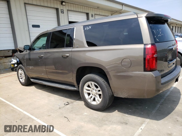 2015 Chevrolet Suburban LS with VIN 1GNSCHKC8FR628406, listed as a Copart auction lot 60682805 with 195,151 mi miles and Salvage title. Bid and sale history available at DreamBid. Image 2.