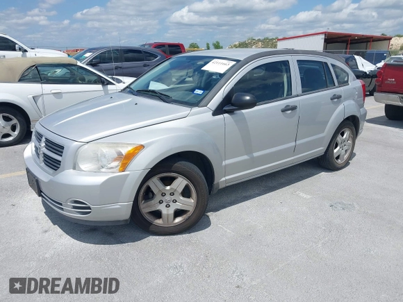 2008 Dodge Caliber SE with VIN 1B3HB28B98D757953, listed as a IAAI auction lot 42111663 with 115,977 mi miles. Bid and sale history available at carsss.com. Image 2.