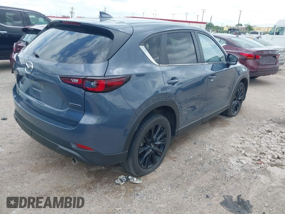 2024 Mazda CX-5 2.5 S Carbon Edition with VIN JM3KFBCL0R0516680, listed as a IAAI auction lot 42140335 with 30,170 mi miles. Bid and sale history available at carsss.com. Image 4.