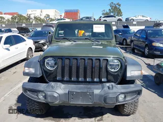 2022 Jeep Wrangler Unlimited Sport with VIN 1C4HJXDG5NW113205, listed as a IAAI auction lot 41836171 with 30,446 mi miles and . Bid and sale history available at DreamBid. Image 13.