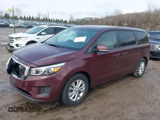 2017 Kia Sedona LX with VIN KNDMB5C12H6236364, listed as a IAAI auction lot 41924391 with 100,546 mi miles. Bid and sale history available at carsss.com. Image 2.