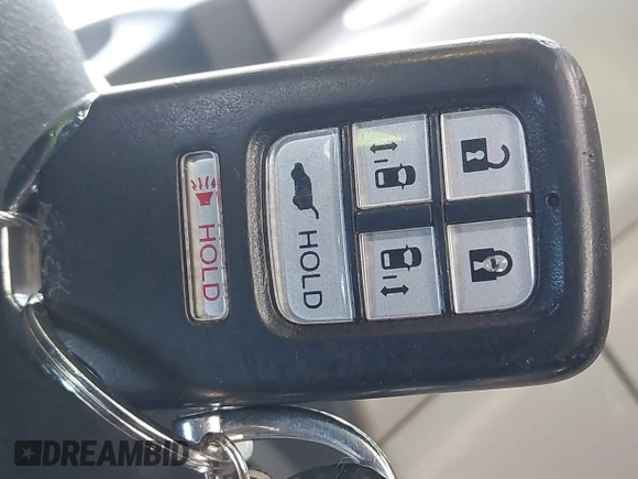 2014 Honda Odyssey Touring with VIN 5FNRL5H91EB093540, listed as a IAAI auction lot 41887412 with 202,076 mi miles and . Bid and sale history available at DreamBid. Image 11.