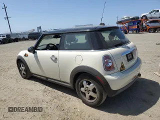 2011 MINI Hardtop with VIN WMWSU3C59BT251488, listed as a Copart auction lot 59236285 with 141,997 mi miles and Clean title. Bid and sale history available at DreamBid. Image 2.