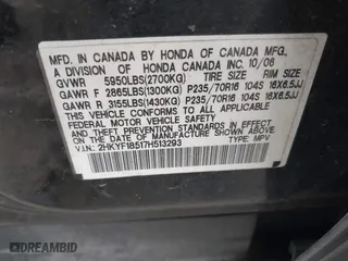 2007 Honda Pilot EX-L with VIN 2HKYF18517H513293, listed as a IAAI auction lot 41957031 with 264,875 mi miles. Bid and sale history available at carsss.com. Image 9.