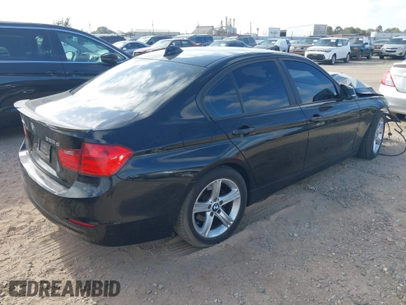 2014 BMW 3 Series 328d xDrive with VIN WBA3D5C53EF147095, listed as a IAAI auction lot 40740496 with 98,834 mi miles. Bid and sale history available at carsss.com. Image 4.