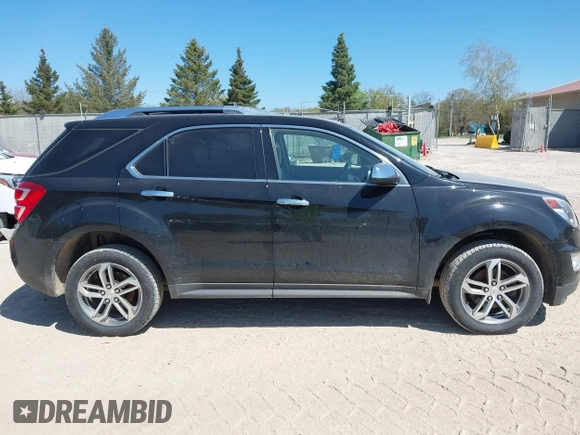2016 Chevrolet Equinox LTZ z VIN 2GNFLGEK8G6288671, wystawiony jako IAAI lot #42220704 z przebiegiem 91 606 mil mil oraz . Historia ofert i sprzedaży dostępna na DreamBid. Obrazek 13.