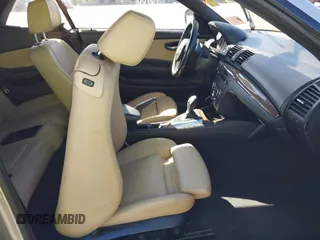 2012 BMW 1 Series 135i with VIN WBAUN7C53CVM26496, listed as a IAAI auction lot 41627261 with 104,568 mi miles and . Bid and sale history available at DreamBid. Image 5.