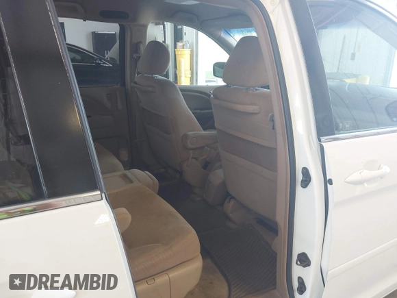 2005 Honda Odyssey EX with VIN 5FNRL38415B010150, listed as a IAAI auction lot 42844859 with 174,421 mi miles and . Bid and sale history available at DreamBid. Image 8.