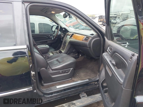 2014 Cadillac Escalade Platinum z VIN 1GYS4DEF9ER212880, wystawiony jako IAAI lot #41954880 z przebiegiem 193 203 mil mil oraz . Historia ofert i sprzedaży dostępna na DreamBid. Obrazek 5.