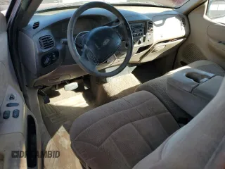1999 Ford F-150 XL with VIN 1FTRX17L1XKB23992, listed as a Copart auction lot 44257695 with Not Provided miles and Salvage Title. Bid and sale history available at carsss.com. Image 8.